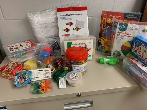 Photo avec des jouets pour Billet sur les achats du SIJE